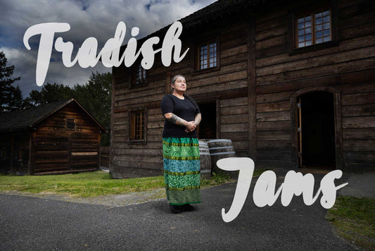 Chef Sarah Mierau of Tradish, wearing a ribbon skirt in front of The Ancestor Cafe in Fort Langley, British Columbia.