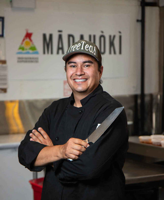 Chef Paul R. Owl stands in the kitchen at Mādahòkì Farm